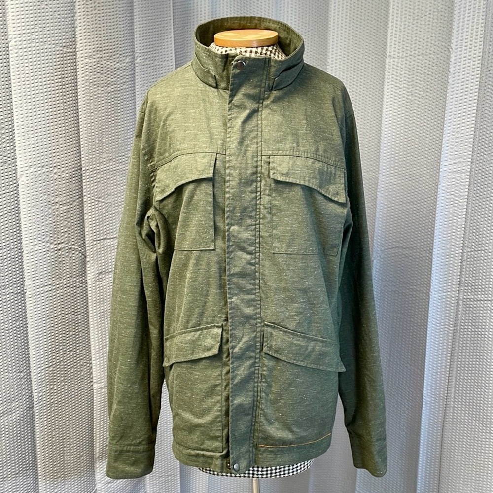 United By Blue men’s/unisex jacket in weathered moss green. Size Medium (men’s).